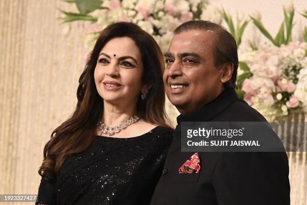 Chairman and Managing Director of Reliance Industries, Indian billionaire businessman Mukesh Ambani with his wife and Founder Chairperson of the...