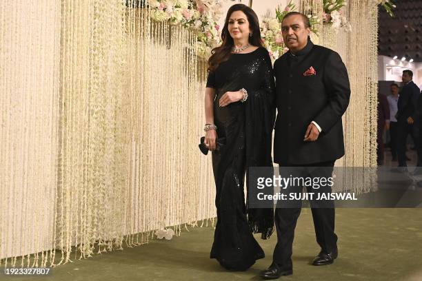 Chairman and Managing Director of Reliance Industries, Indian billionaire businessman Mukesh Ambani with his wife and Founder Chairperson of the...