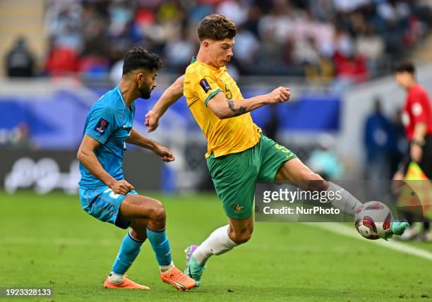 Keanu Baccus of Australia is battling for the ball with Rahul Bheke of India during the AFC Asian Cup 2023 match between Australia and India at Ahmad...
