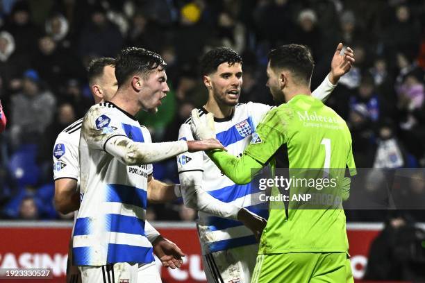 Zwolle goalkeeper Jasper Schendelaar is thanked by his teammates after a good save during the Dutch Eredivisie match between PEC Zwolle and sc...