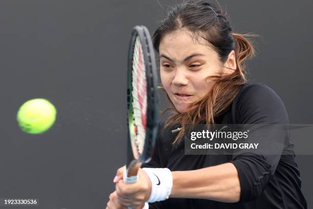 Britain's Emma Raducanu attends a practice session on day one of the Australian Open tennis tournament in Melbourne on January 14, 2024. / -- IMAGE...