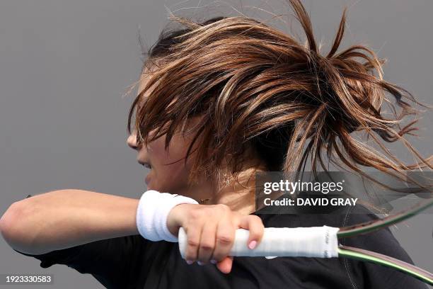 Britain's Emma Raducanu attends a practice session on day one of the Australian Open tennis tournament in Melbourne on January 14, 2024. / -- IMAGE...