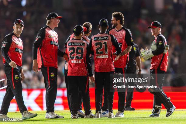 Melbourne Renegades players celebrating the fall of Melbourne Stars player Thomas Rogers during KFC Big Bash League T20 match between Melbourne...
