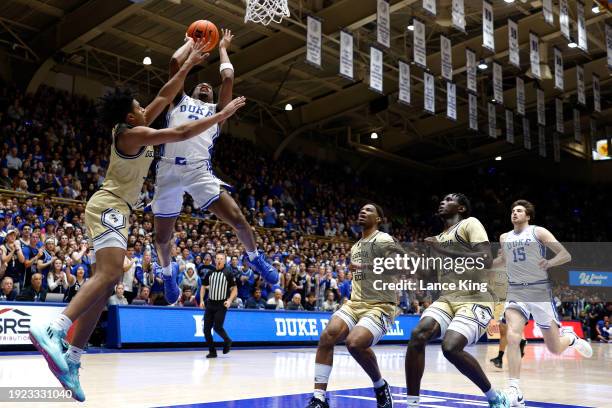 Jeremy Roach of the Duke Blue Devils is fouled during a shot attempt by Dallan Coleman of the Georgia Tech Yellow Jackets during the second half of...