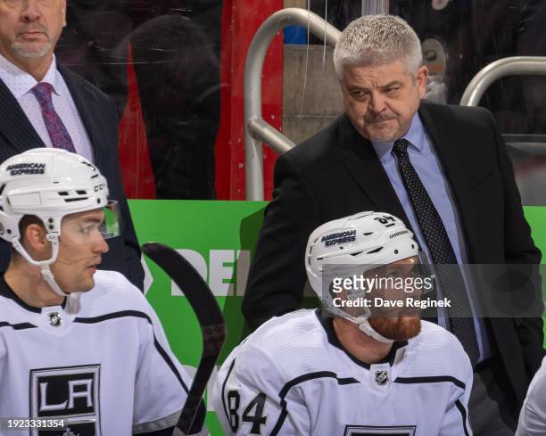 Head coach Todd McLellan of the Edmonton Oilers looks down his bench during first period of the game against the Detroit Red Wings at Little Caesars...