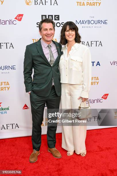 Michael A. Goorjian and Neve Campbell at the BAFTA Tea Party held at The Maybourne Beverly Hills on January 13, 2024 in Beverly Hills, California.