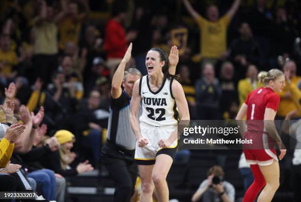 Guard Caitlin Clark of the Iowa Hawkeyes celebrates after a 3-point basket during the first half against the Indiana Hoosiers at Carver-Hawkeye Arena...