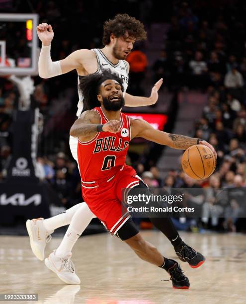 Colby White of the Chicago Bulls is fouled by Cedi Osman of the San Antonio Spurs in the first half at Frost Bank Center on January 13, 2024 in San...