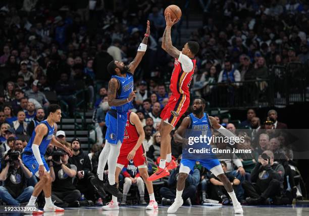 Jordan Hawkins of the New Orleans Pelicans shoots the ball during the game against the Dallas Mavericks on January 13, 2024 at the American Airlines...
