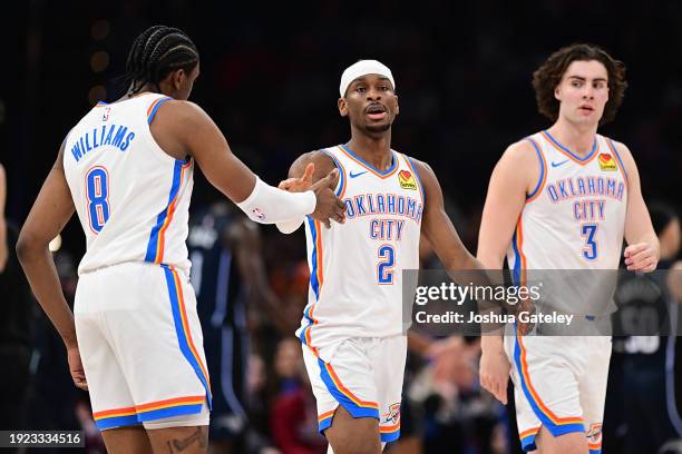 Jalen Williams and Shai Gilgeous-Alexander of the Oklahoma City Thunder celebrate during the second half against the Orlando Magic at Paycom Center...