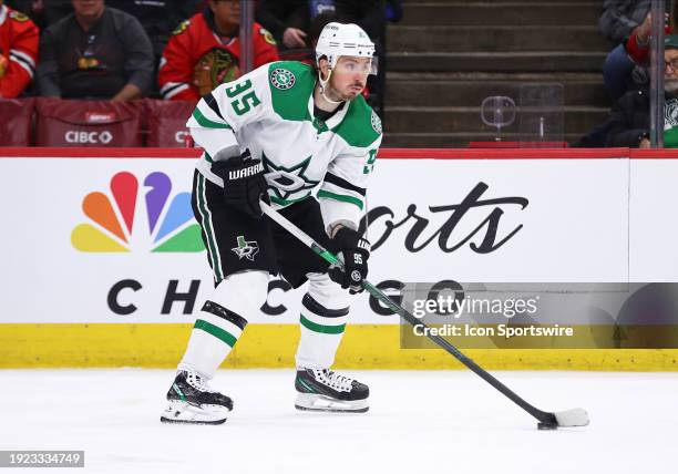 Craig Smith of the Dallas Stars skates with the puck during the second period against the Chicago Blackhawks at the United Center on January 13, 2024...