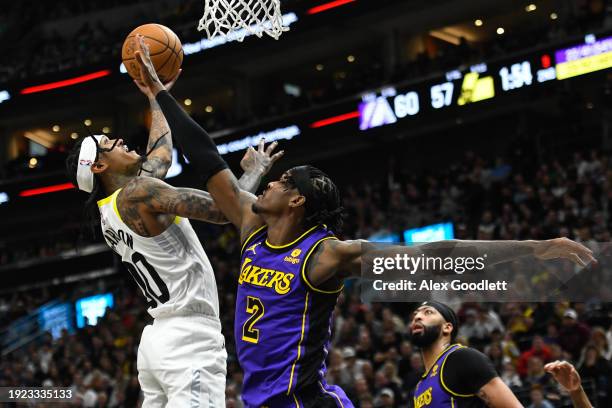 Jordan Clarkson of the Utah Jazz shoots over Jarred Vanderbilt of the Los Angeles Lakers during the first half of a game at Delta Center on January...