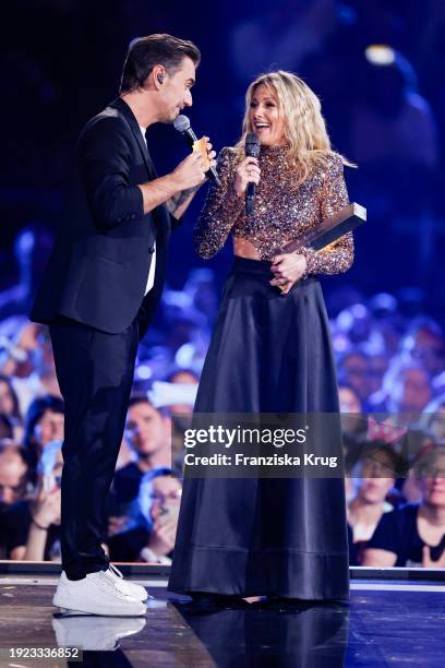 Florian Silbereisen and Helene Fischer during on stage at the Schlagerchampions "Das grosse Fest der Besten" at Velodrom on January 13, 2024 in...