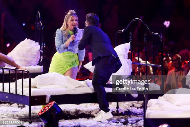 Swiss singer Beatrice Egli and German singer and presenter Florian Silbereisen perform during the Schlagerchampions "Das Groe Fest Der Besten" at...