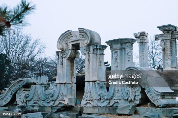 Tourists visit the ruins of the Dashuifa Site, a famous scenic spot in the Old Summer Palace, in Beijing, China, January 13, 2024.