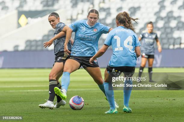 Leticia McKenna of City stretches in front of Wanderers Olivia Price for the ball during the A-League Women round 12 match between Western Sydney...