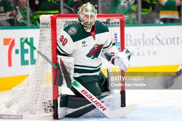 Jesper Wallstedt of the Minnesota Wild warms up ahead of his NHL debut against the Dallas Stars at American Airlines Center on January 10, 2024 in...
