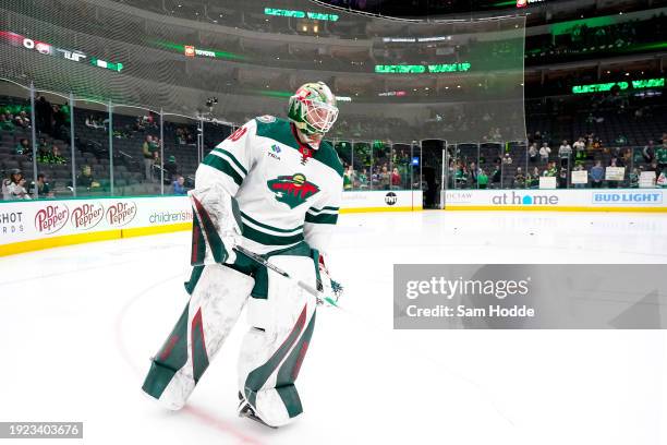 Jesper Wallstedt of the Minnesota Wild skates during warm up ahead of his NHL debut against the Dallas Stars at American Airlines Center on January...