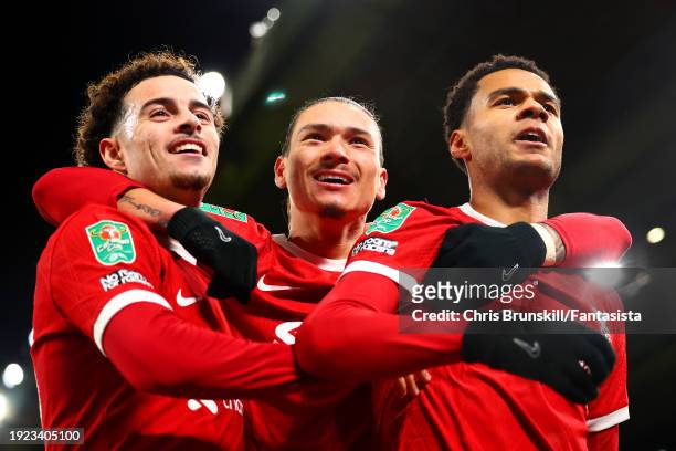 Cody Gakpo of Liverpool celebrates scoring his side's second goal with team-mate Darwin Nunez and Curtis Jones during the Carabao Cup Semi Final...