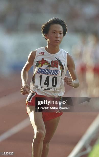 Junxia Wang of China in action during the 10,000 metres event at the World Championships at the Gottleib Daimler Stadium in Stuttgart, Germany. Wang...