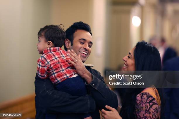 Republican presidential candidate businessman Vivek Ramaswamy has a moment with his family before speaking at a rally at the Iowa State Capital...