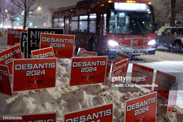 Campaign signs for Republican presidential candidate, Florida Gov. Ron Desantis line the road in front of Drake University, where CNN is hosting a...