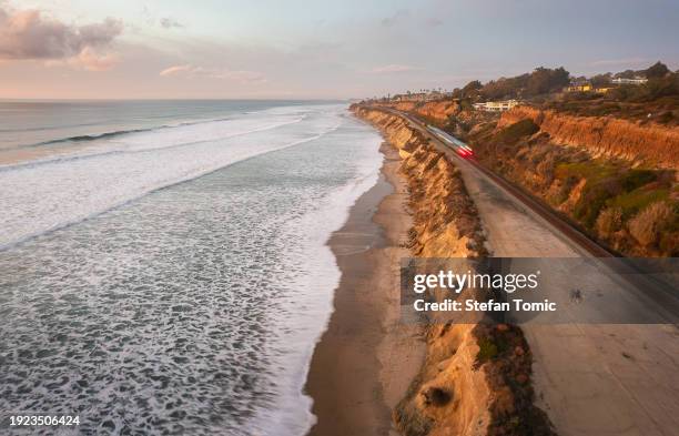 train passes over torrey pines state beach in san diego, california - south stock pictures, royalty-free photos & images