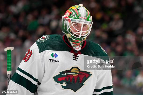 Jesper Wallstedt of the Minnesota Wild looks on during the first period of his NHL debut against the Dallas Stars at American Airlines Center on...