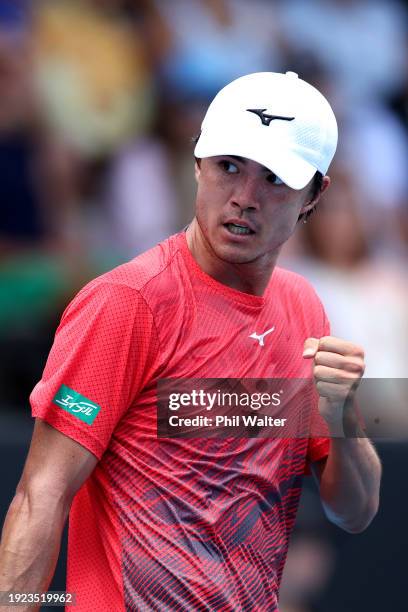 Taro Daniel of Japan celebrates a point in his match against Alexandre Muller of France during the 2024 Men's ASB Classic at ASB Tennis Centre on...