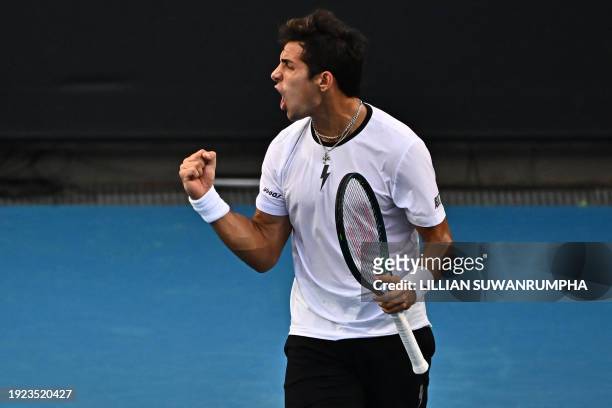 Chile's Christian Garin reacts after a point against Australia's Christopher O'Connell during their men's singles match on day one of the Australian...