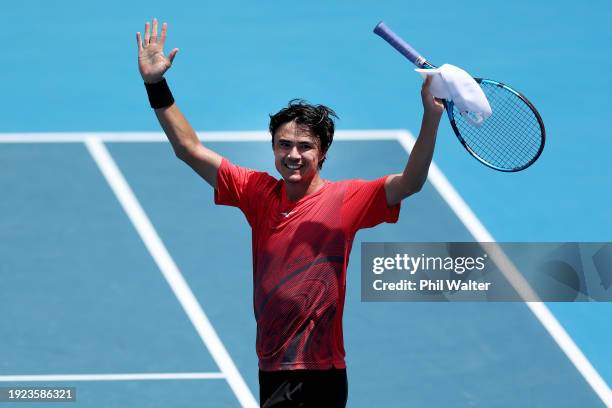 Taro Daniel of Japan celebrates winning his match against Alexandre Muller of France during the 2024 Men's ASB Classic at ASB Tennis Centre on...