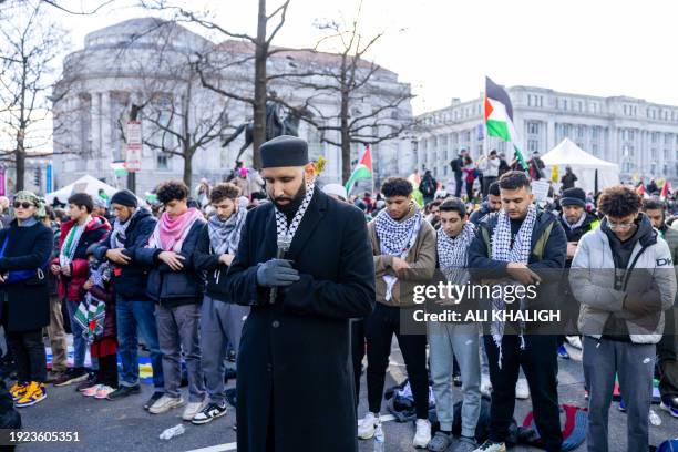 Washington D.C, USA. During the March on Washington for Gaza rally in Washington, DC, on Saturday, Jan. 13 numerous Muslim participants engaged in...