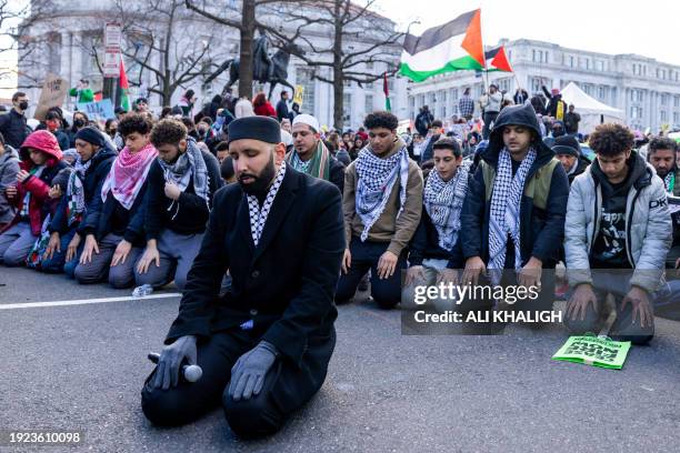 Washington D.C, USA. During the March on Washington for Gaza rally in Washington, DC, on Saturday, Jan. 13 numerous Muslim participants engaged in...
