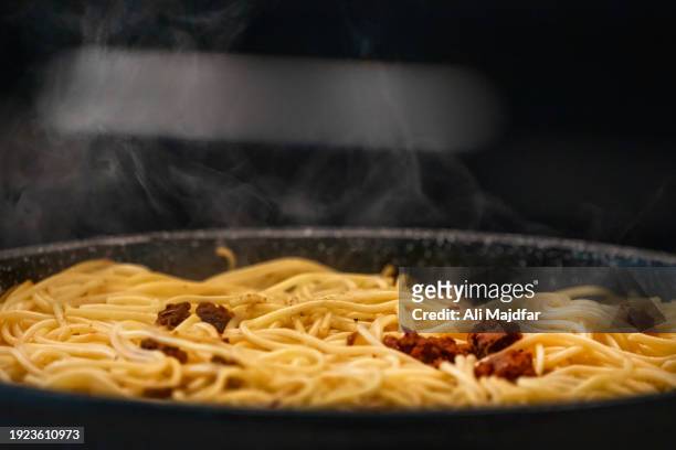 hot spaghetti - spagetti stock pictures, royalty-free photos & images