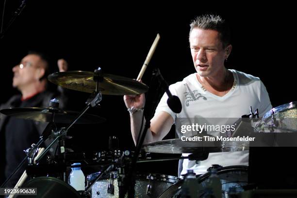 Bono and Larry Mullen Jr. Of U2 perform during the band's 360 Tour at Sam Boyd stadium on October 23, 2009 in Las Vegas, Nevada.