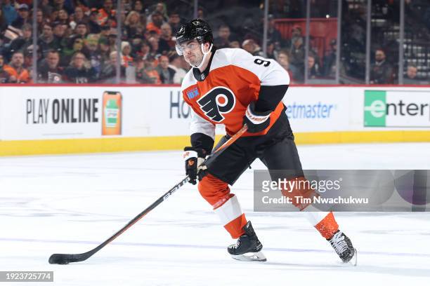 Jamie Drysdale of the Philadelphia Flyers skates with the puck during the second period against the Montreal Canadiensat the Wells Fargo Center on...
