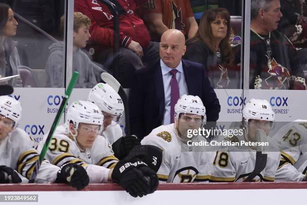 Head coach Jim Montgomery of the Boston Bruins during the NHL game at Mullett Arena on January 09, 2024 in Tempe, Arizona. The Coyotes defeated the...