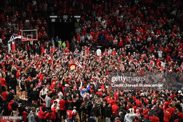 Fans storm the court after the Nebraska Cornhuskers defeated the Purdue Boilermakers at Pinnacle Bank Arena on January 9, 2024 in Lincoln, Nebraska.