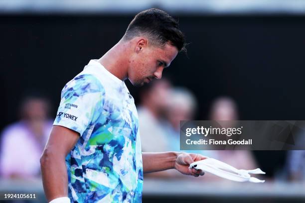 Daniel Altmaier of Germany retires injuredduring his match against Arthur Fils of France during the 2024 Men's ASB Classic at ASB Tennis Centre on...
