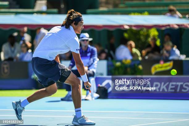 Zhang Zhizhen of China seen in action during the last match of Day 2 of the Care Wellness Kooyong Classic Tennis Tournament against Max Purcell of...
