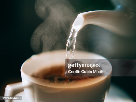 Fresh hot water for organic sage herbal tea at teatime. Fresh hot water for organic sage herbal tea at teatime.