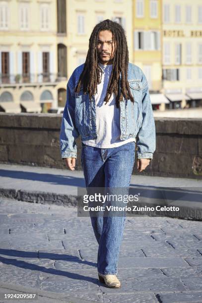 Luka Sabbat poses for a street style shooting during the GUESS JEANS "The Next 40 Years Of Denim" launch on January 09, 2024 in Florence, Italy.