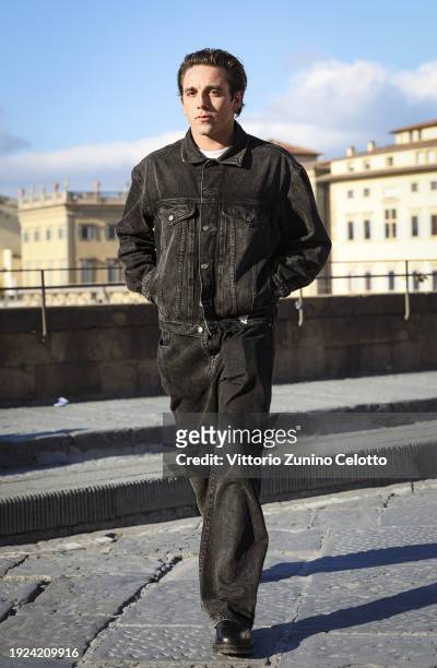 Alex Midler poses for a street style shooting during the GUESS JEANS "The Next 40 Years Of Denim" launch on January 09, 2024 in Florence, Italy.