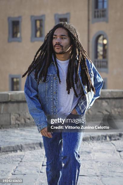 Luka Sabbat poses for a street style shooting during the GUESS JEANS "The Next 40 Years Of Denim" launch on January 09, 2024 in Florence, Italy.