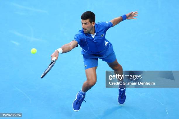 Novak Djokovic of Serbia plays a backhand during A Night with Novak & Friends at Rod Laver Arena ahead of the 2024 Australian Open at Melbourne Park...