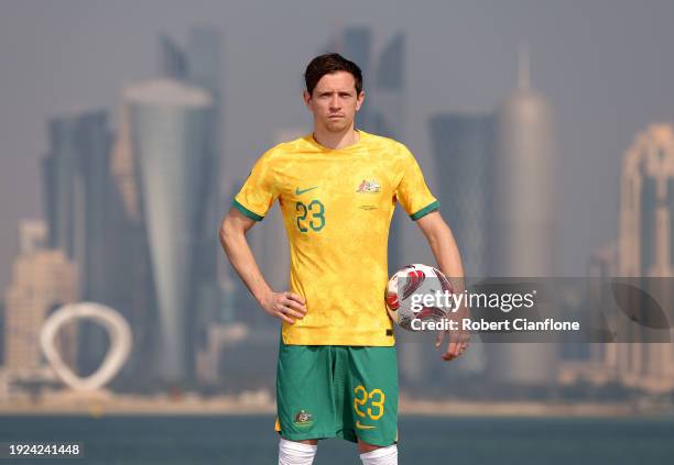 Craig Goodwin of Australia poses during an Australia Socceroos portrait session ahead of the the AFC Asian Cup at the Corniche on January 11, 2024 in...