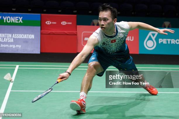 Ng Ka Long of Hong Kong in action against Kidambi Srikanth of India during the men singles on day three of the Malaysia Open at Axiata Arena on...