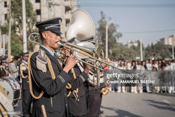 Members of the Ethiopian Federal March Band perform during a mass wedding called 'Yeshih Gabicha' in Addis Ababa, Ethiopia on January 14, 2024....