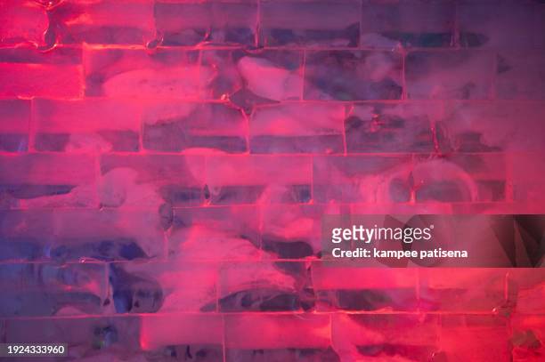 wall composed of bricks of ice, full frame - melting snowball stock pictures, royalty-free photos & images