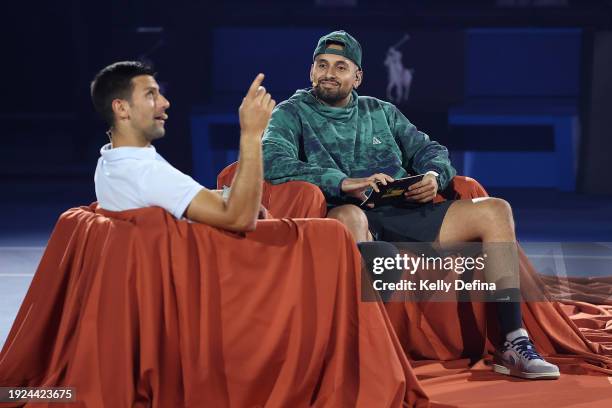 Novak Djokovic is interviewed by Nick Kyrgios for Hana Kuma during a charity match ahead of the 2024 Australian Open at Melbourne Park on January 11,...